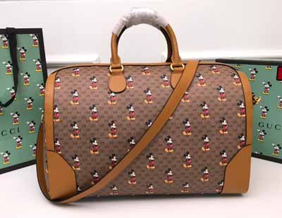 Gucci Disney米色/乌木色米奇图案迷你GG Supreme高等人造帆布行李袋547953