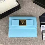 PRADA女士短款翻盖钱夹 专柜新款式 官网同步 1MH840 海蓝色方块蝴蝶结 意大利高等原单十字纹牛皮质感极好 进口黄铜厚金电镀金属五金配件 质量手感一流 长12cm高8.5cm