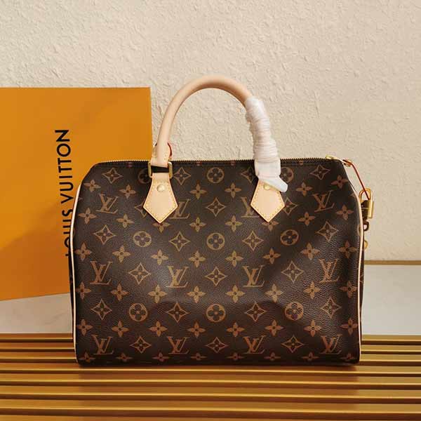 LV Monogram帆布完美结合Speedy 30手袋，时尚魅力尽显，都市女性的理想之选！